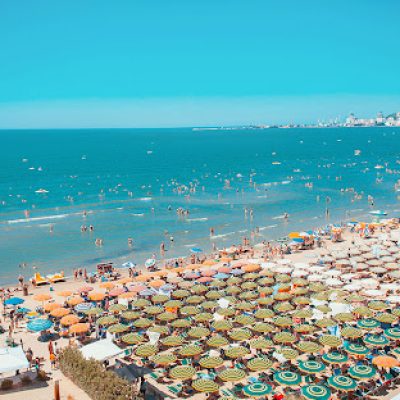 Sunny day and panoramic view to Durres beach. Blue sky and water of Adriatic Sea.
